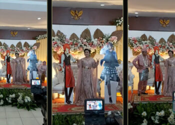 Viral! Pengantin wanita ditemani kadbod Genshin Impact di atas pelamin!